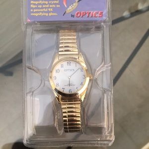 Optics quartz‎ watch. Gold stretchy band, magnifying crystal NEW classic